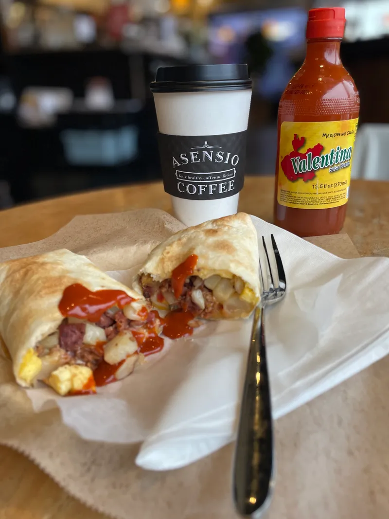 Breakfast item with hot sauce on the side